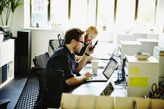 Business executive working on laptop