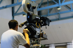cameraman operating a movie camera
