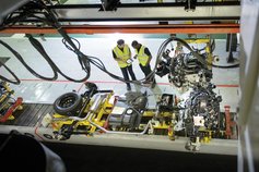 Car workers discussing work