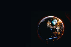 Man drilling under circle fire flames black background