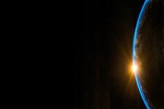 Blue glowing light earth view