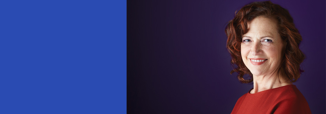 Lady wearing red facing camera side wards