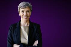 Lady with grey hair smiling