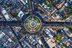 Aerial view road roundabout with car lots of city