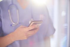 Doctor with mobile phone