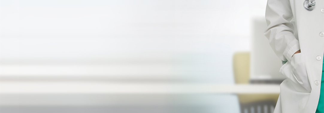 Doctor’s coat with chair in background