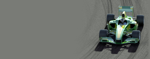 Green race car on a race track