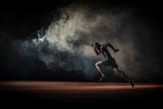 Man sprinting in the dark