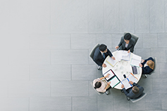 Aerial view having meeting at table