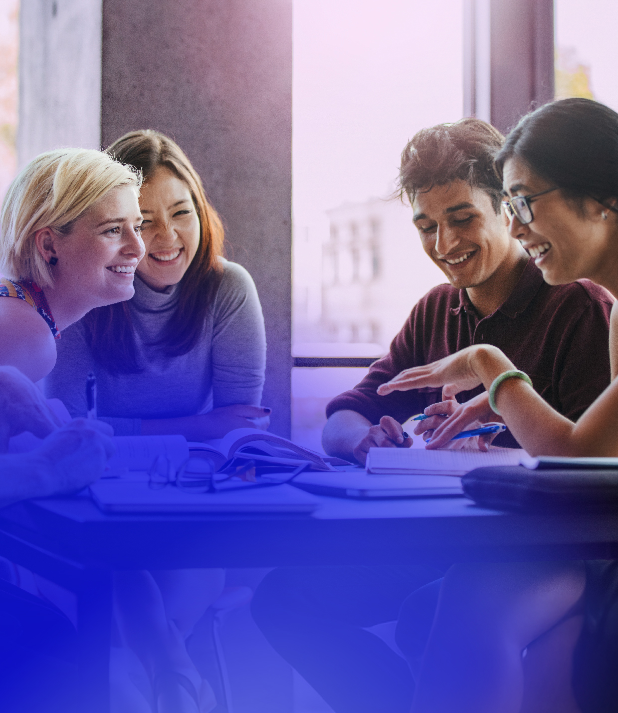 Group of young people having full while in a meeting