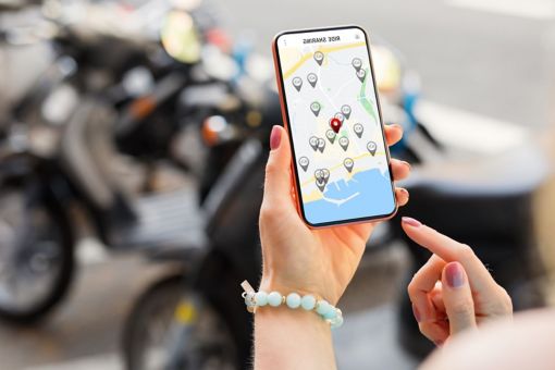 smartphone showing scooter sharing locations