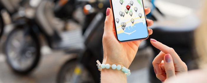 smartphone showing scooter sharing locations