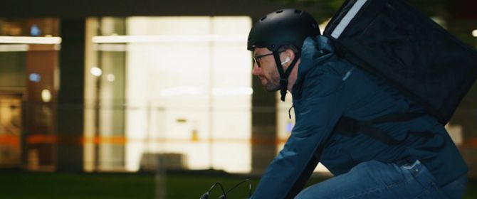 Delivery guy on bicycle