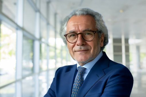 Man smiling while facing forward