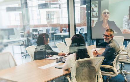 Conference room with hybrid team meeting