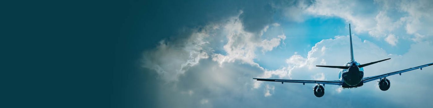 Airplane flying through clouds