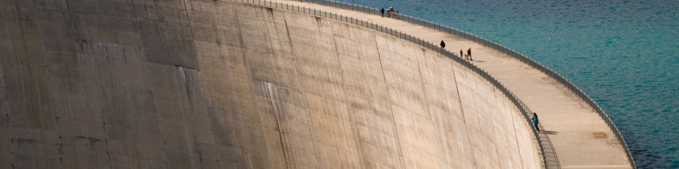Wall of a dam holding up water