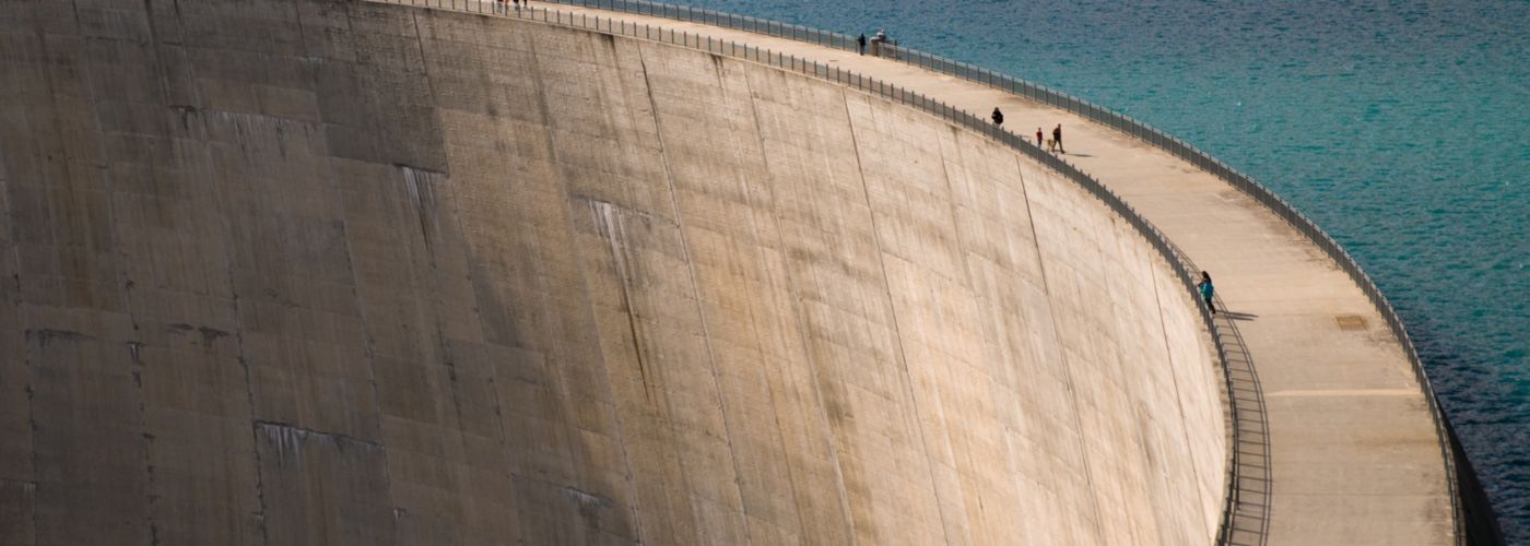 Wall of a dam holding up water