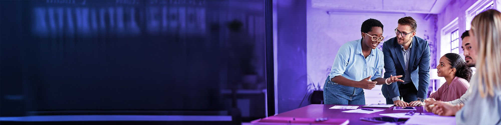 Young people having fun while working on a group project