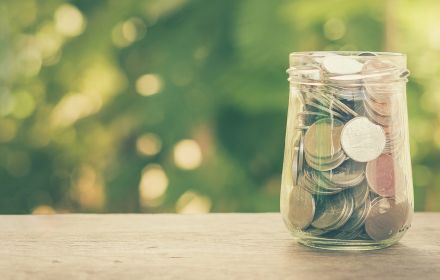 Coins in glass jar