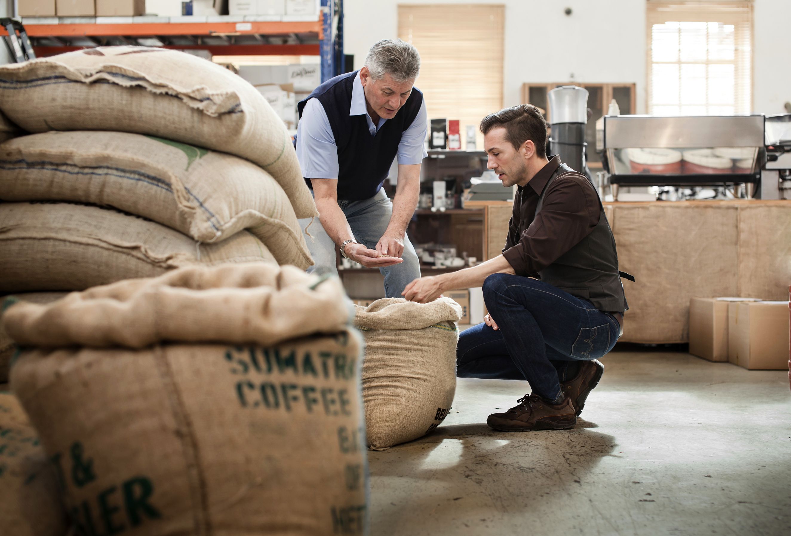 Men talking about coffee beans