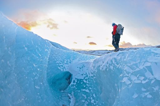 Mountain climber on glacier