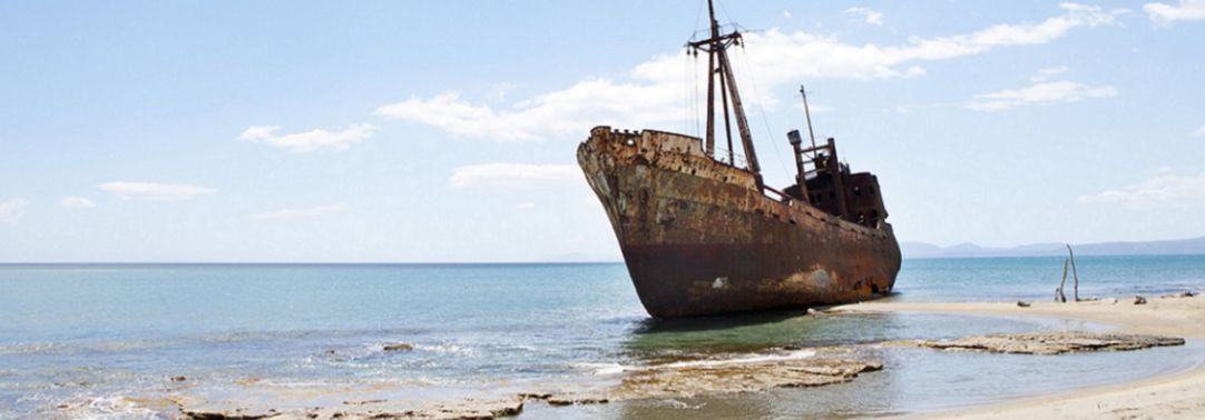 KPMG IFRS Newsletter: Impairment publication image: rusting hull of a ship on a beach
