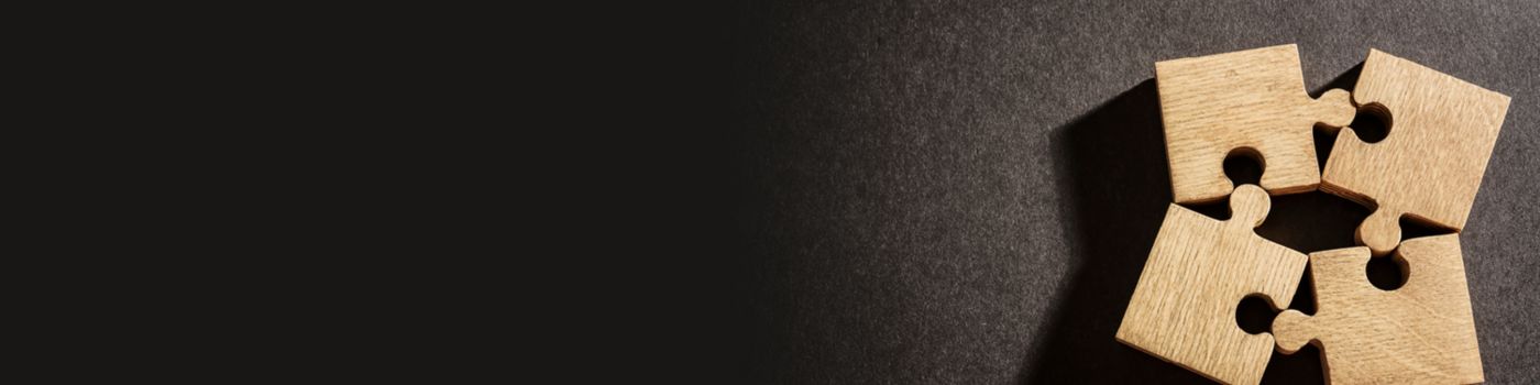 puzzle pieces against dark background