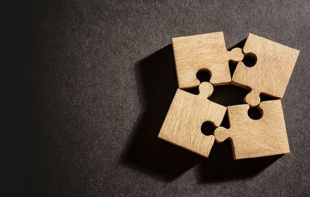 puzzle pieces against dark background