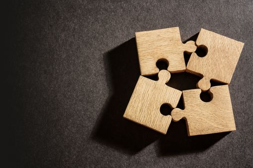 puzzle pieces against dark background