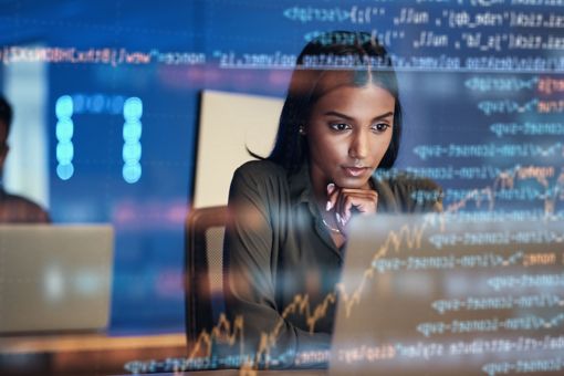 woman looking at laptop