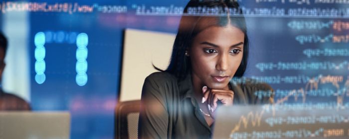 woman looking at laptop