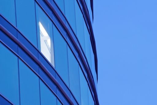 Banking | Illuminated window on a modern building