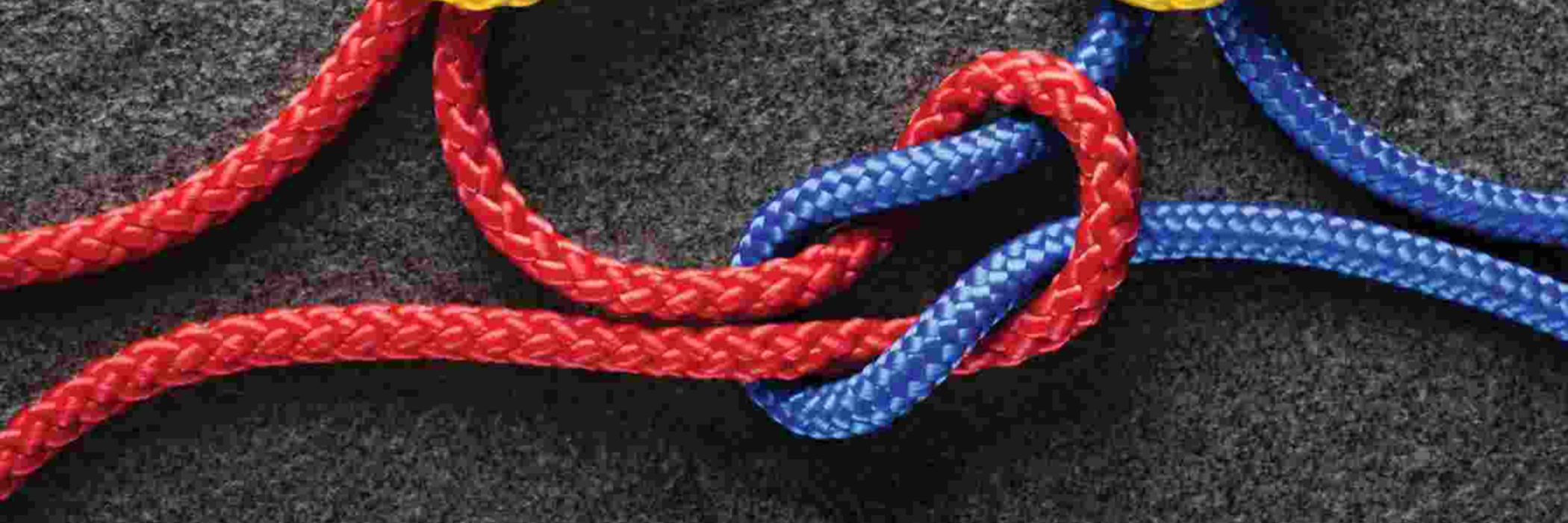 KPMG IFRS business combinations feedback article image: colourful ropes hitched together
