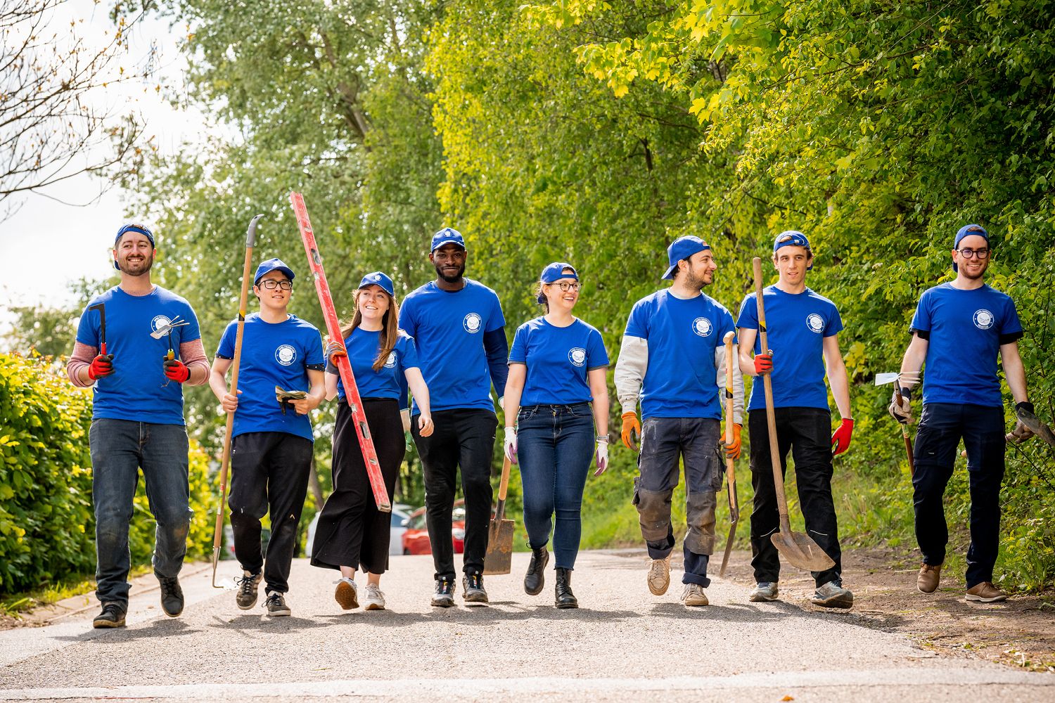 the team of KPMG volunteers walking side by side