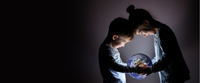 children holding planet