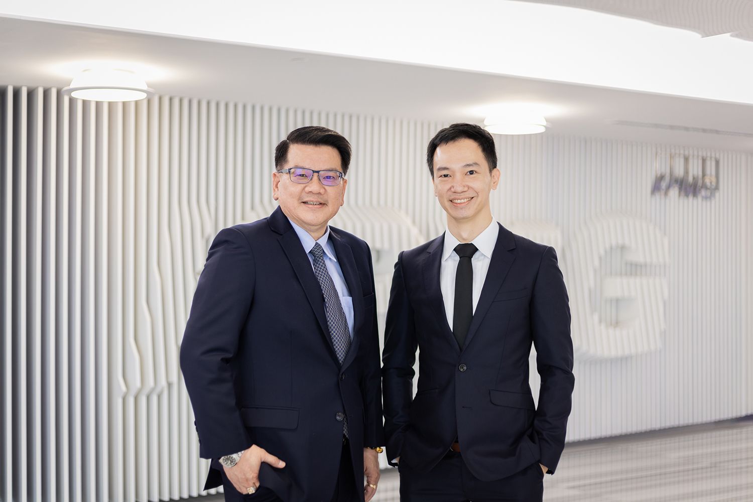 Charoen Phosamritlert and Abhisit Pinmaneekul