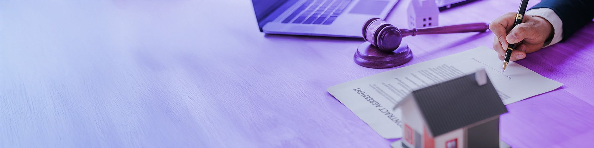 Man signing a housing contract
