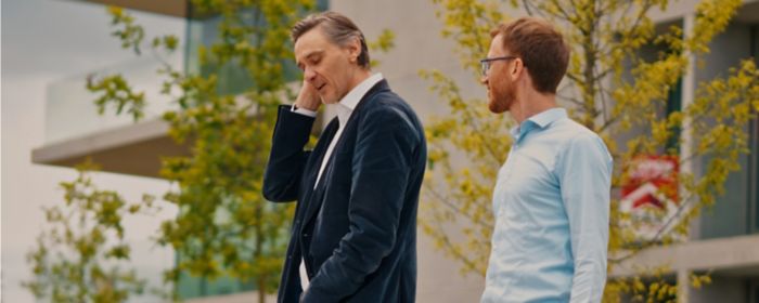 Kobe Geryl from KPMG in Belgium and Geert Aelbrecht from BESIX are at a BESIX construction site, discussing the company’s climate transition.