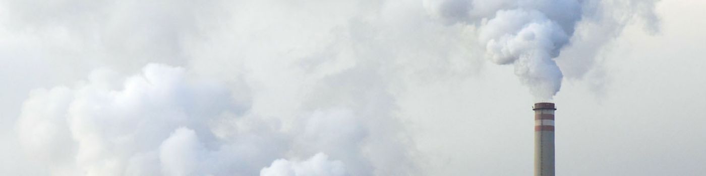 Smoke emitting from smoke stack