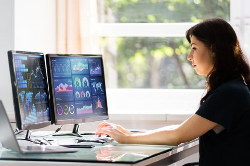 woman looking at tax dashboards