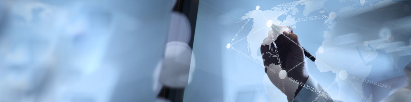 Man marking coordinates on global map