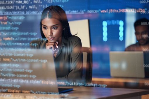 woman looking at laptop