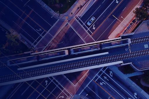 Aerial view of railway bridge over road intersection