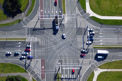 Cars moving through an intersection
