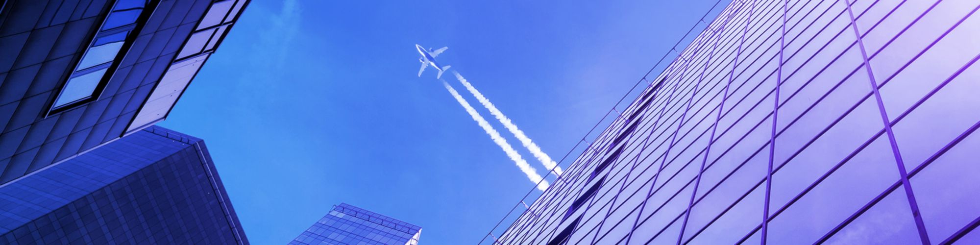 Airplane fly-over modern Building