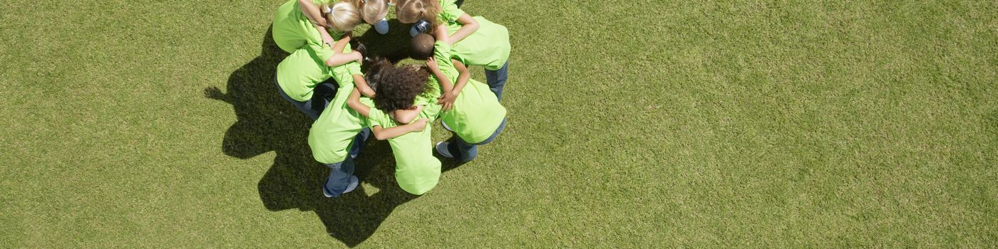 Group of children in huddle