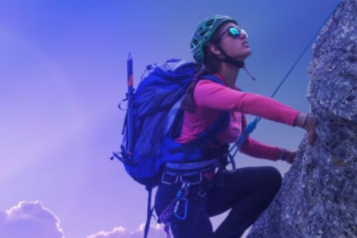 banner-woman-climbing-mountain