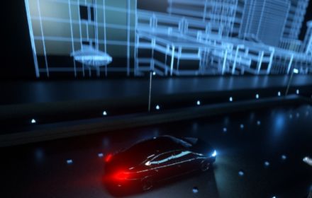 black car moving on road with lights