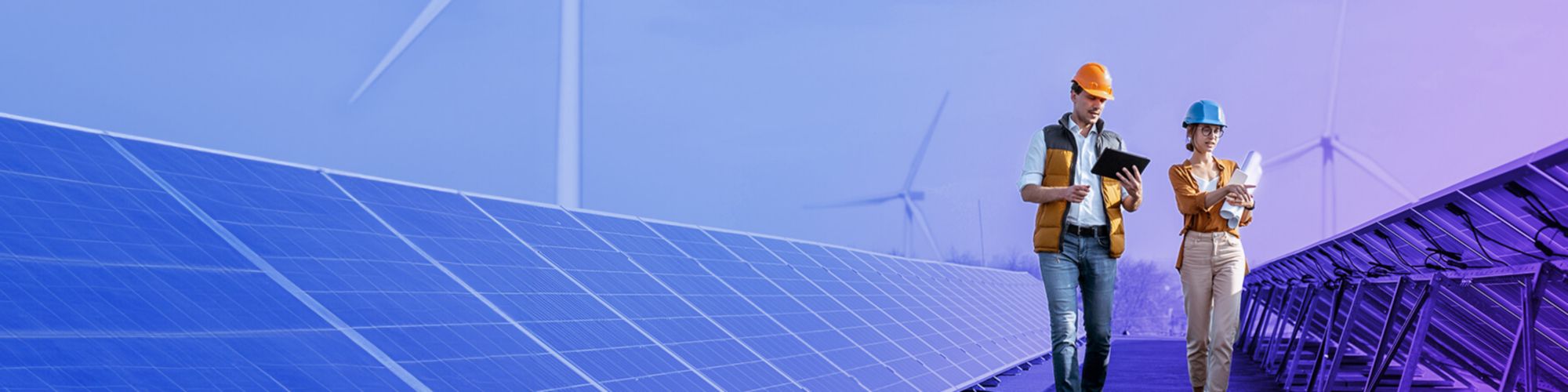 people walking with renewable energy solutions in the background